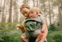 Newborn baby peacefully sleeping in a crib with soft lighting, symbolizing gentle bedtime techniques for better rest.