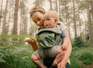 Newborn baby peacefully sleeping in a crib with soft lighting, symbolizing gentle bedtime techniques for better rest.