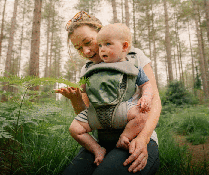 Newborn baby peacefully sleeping in a crib with soft lighting, symbolizing gentle bedtime techniques for better rest.